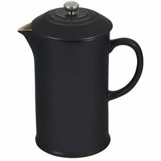 Presse française en céramique noire avec couvercle en métal.